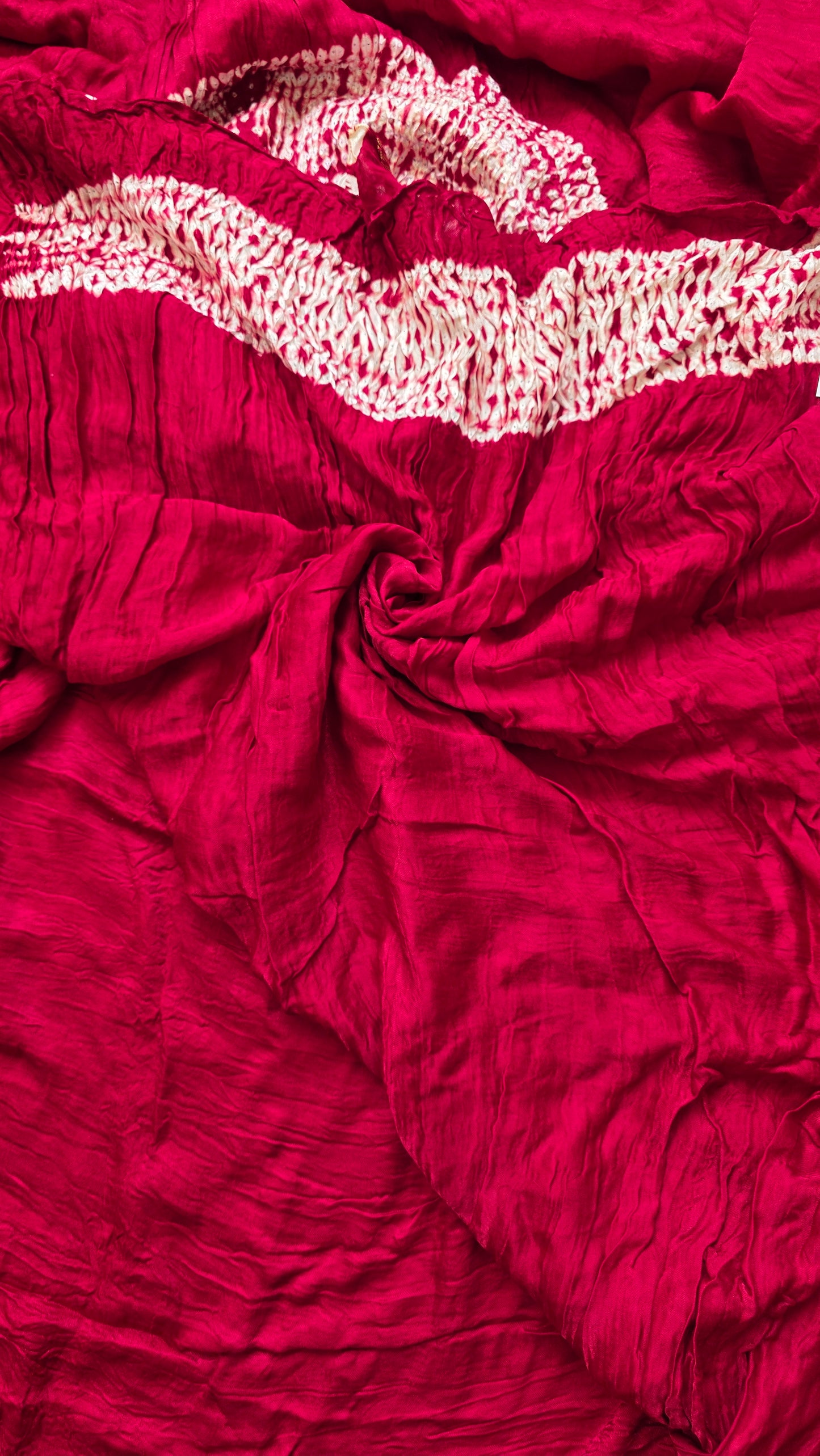 Boond| Maroon plain Bandhej Saree with Rasmandal Pallu