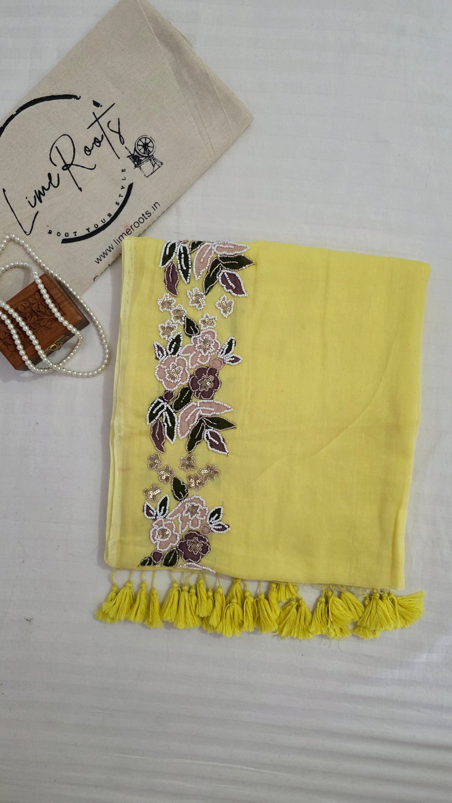 Yellow Hand-embroidered mulmul saree