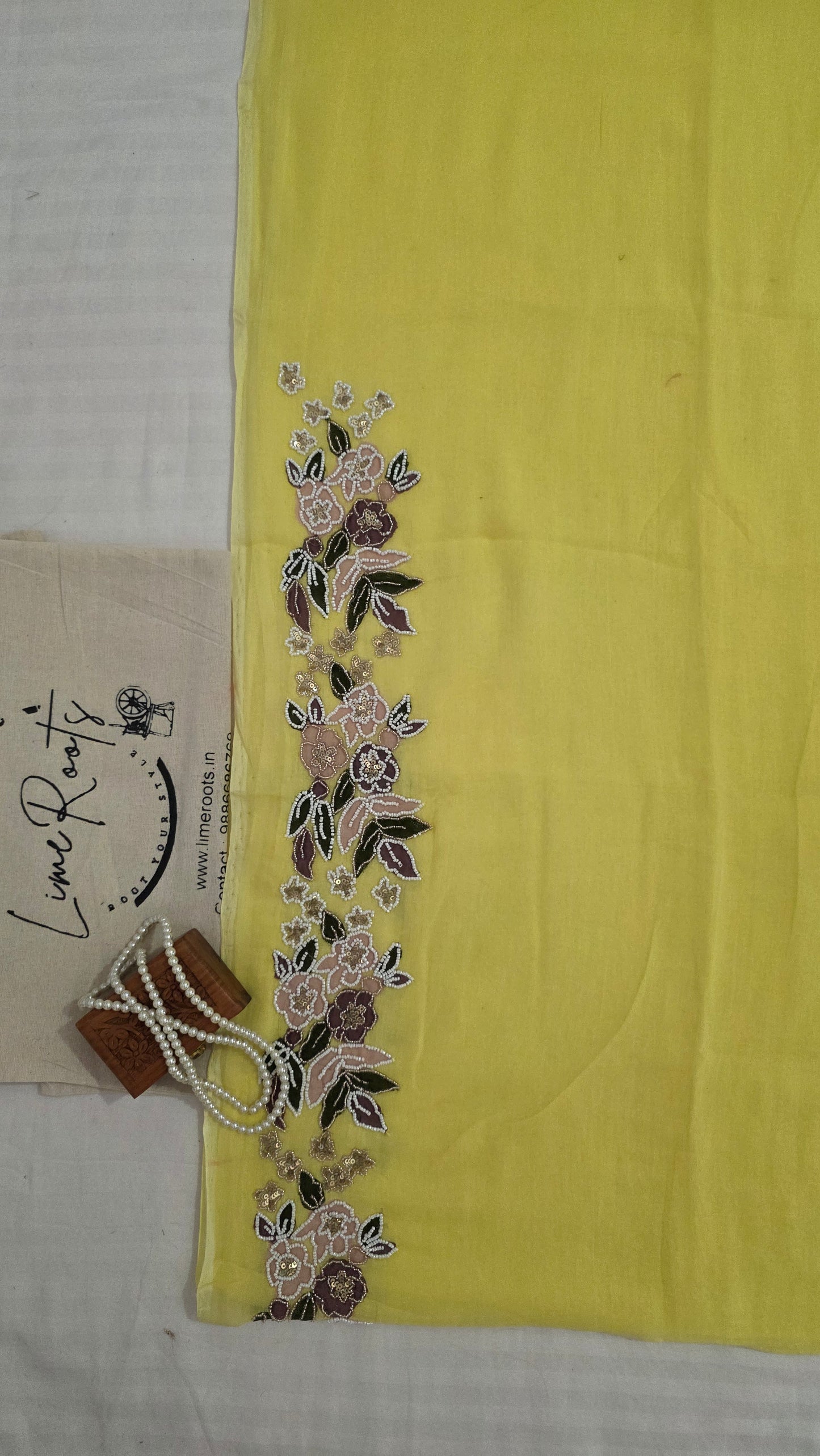 Yellow Hand-embroidered mulmul saree