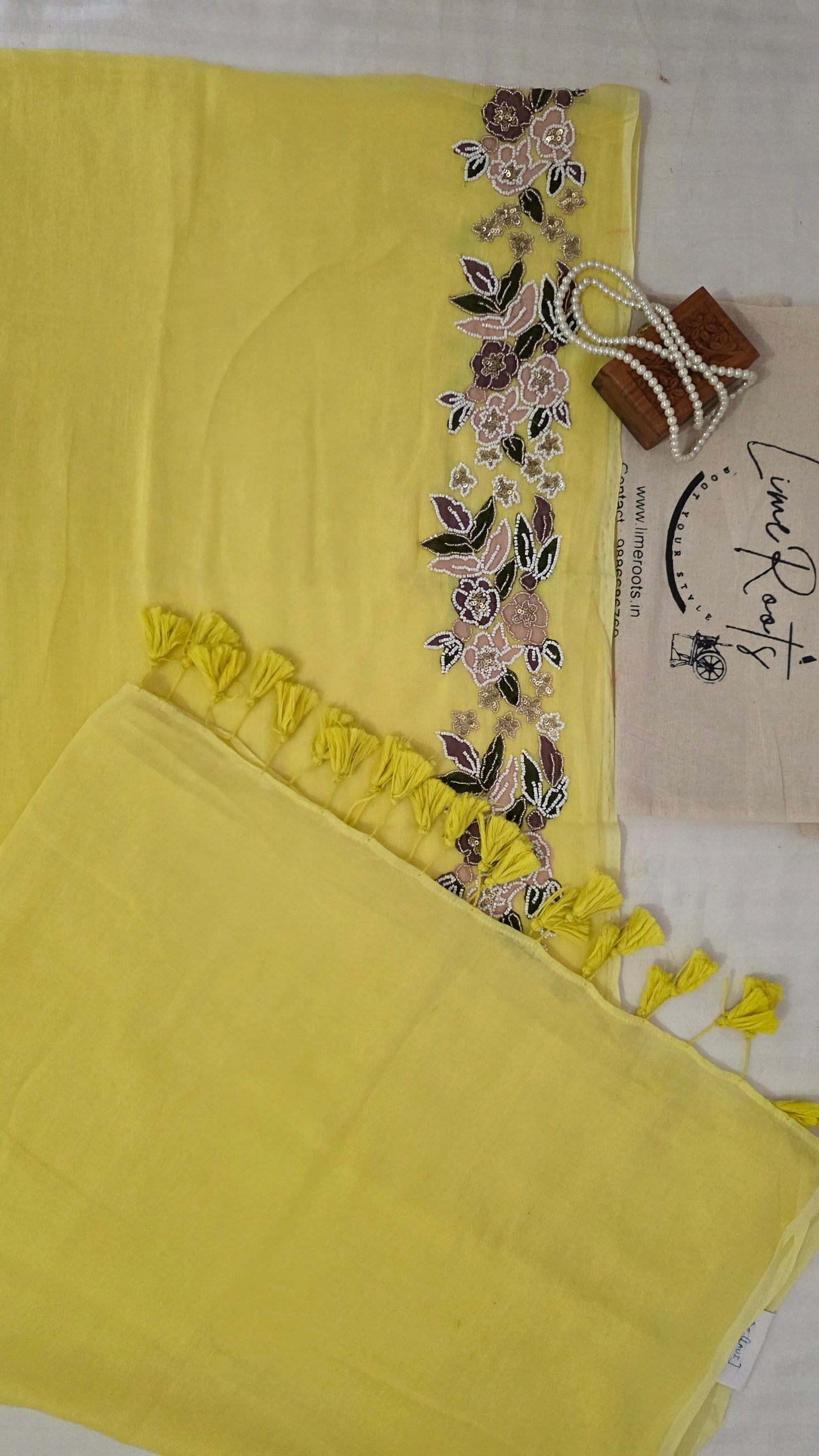 Yellow Hand-embroidered mulmul saree