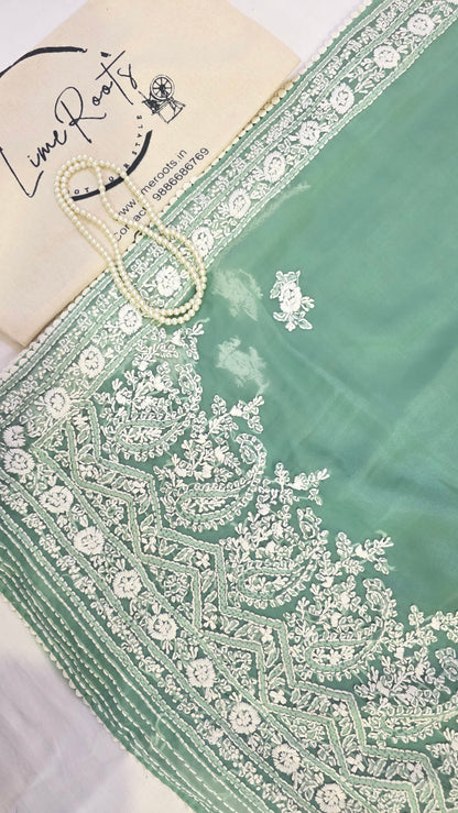 Green organza saree with Chikankari embroidery