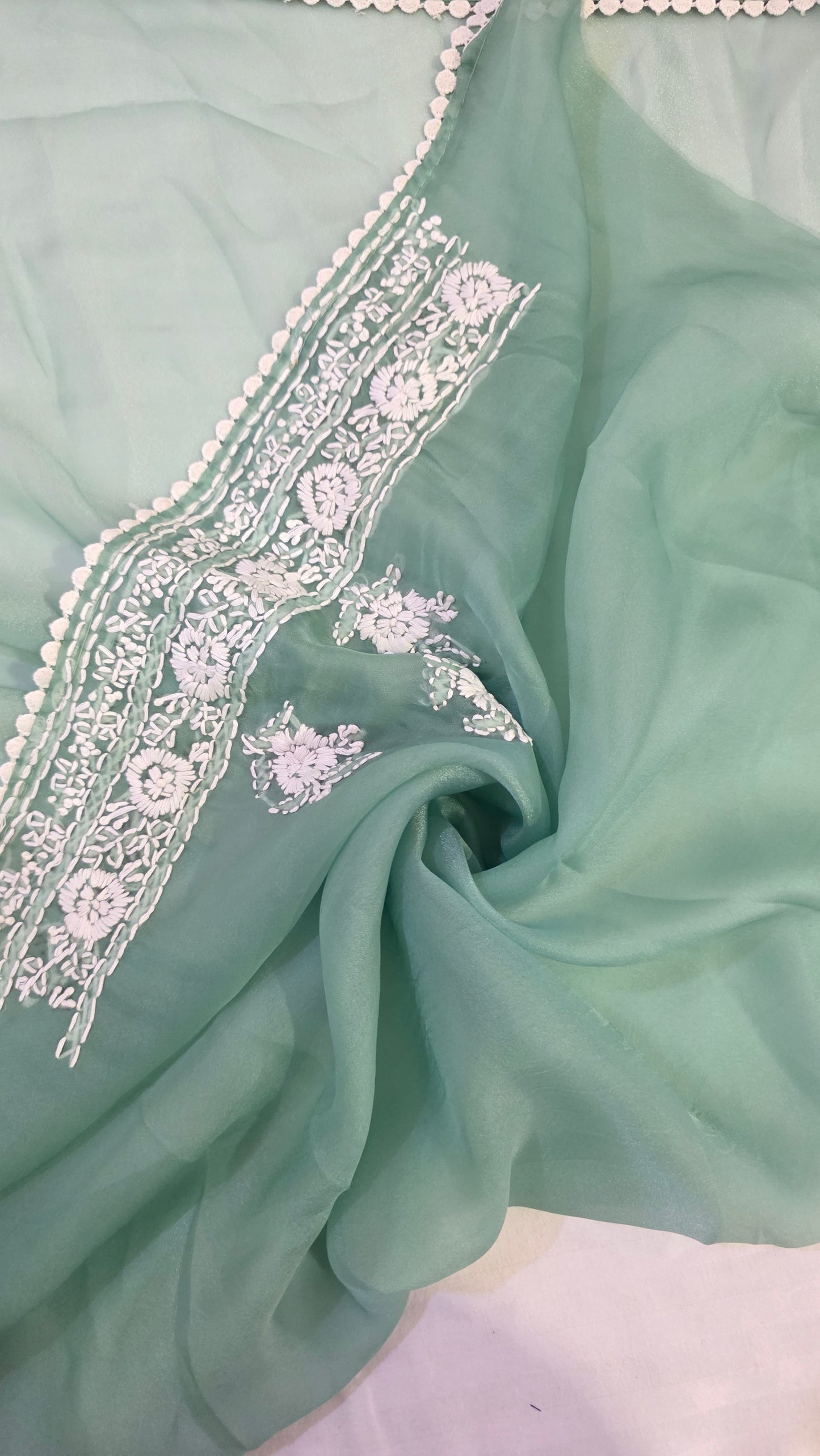 Green organza saree with Chikankari embroidery