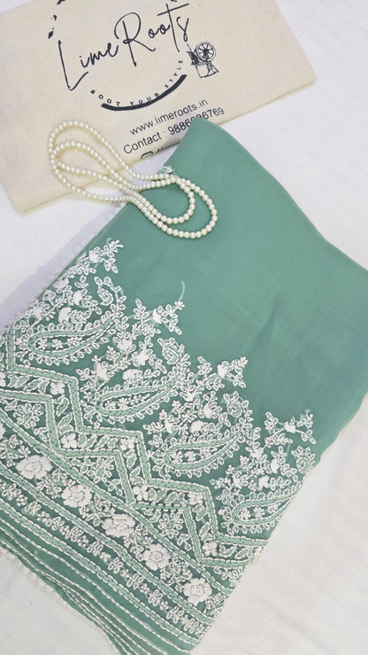 Green organza saree with Chikankari embroidery
