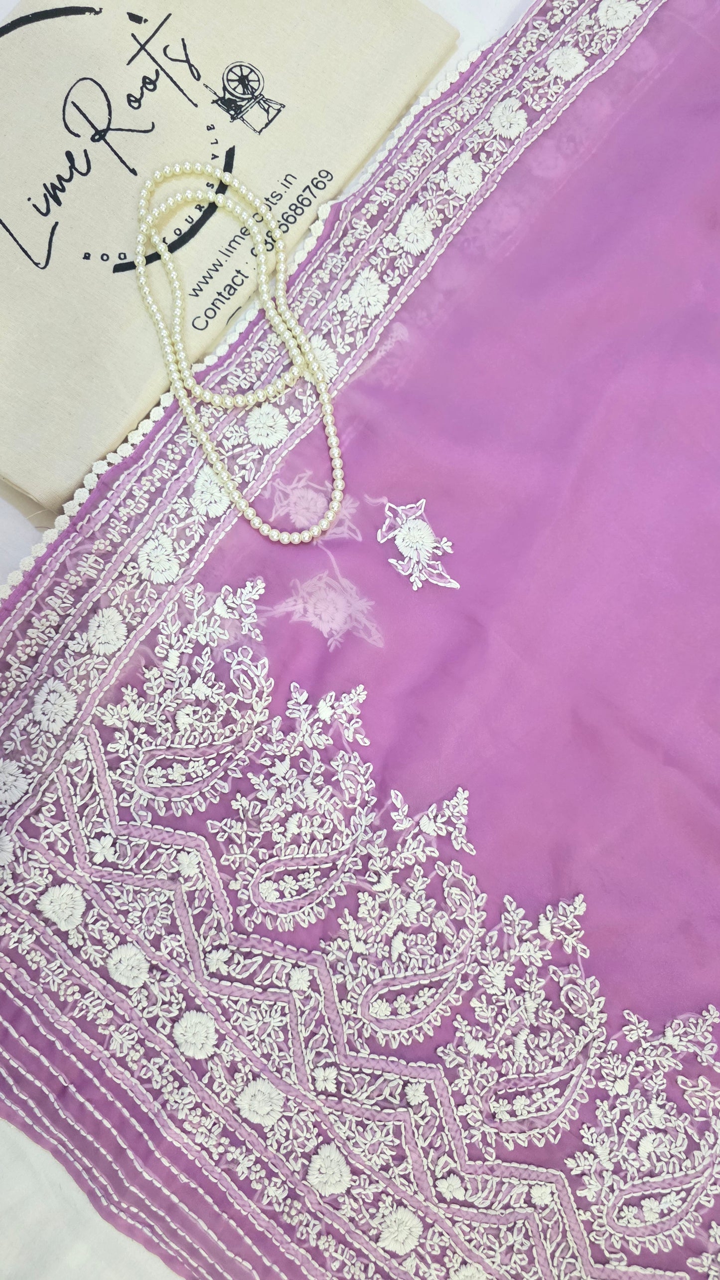 Lavender organza saree with Chikankari embroidery