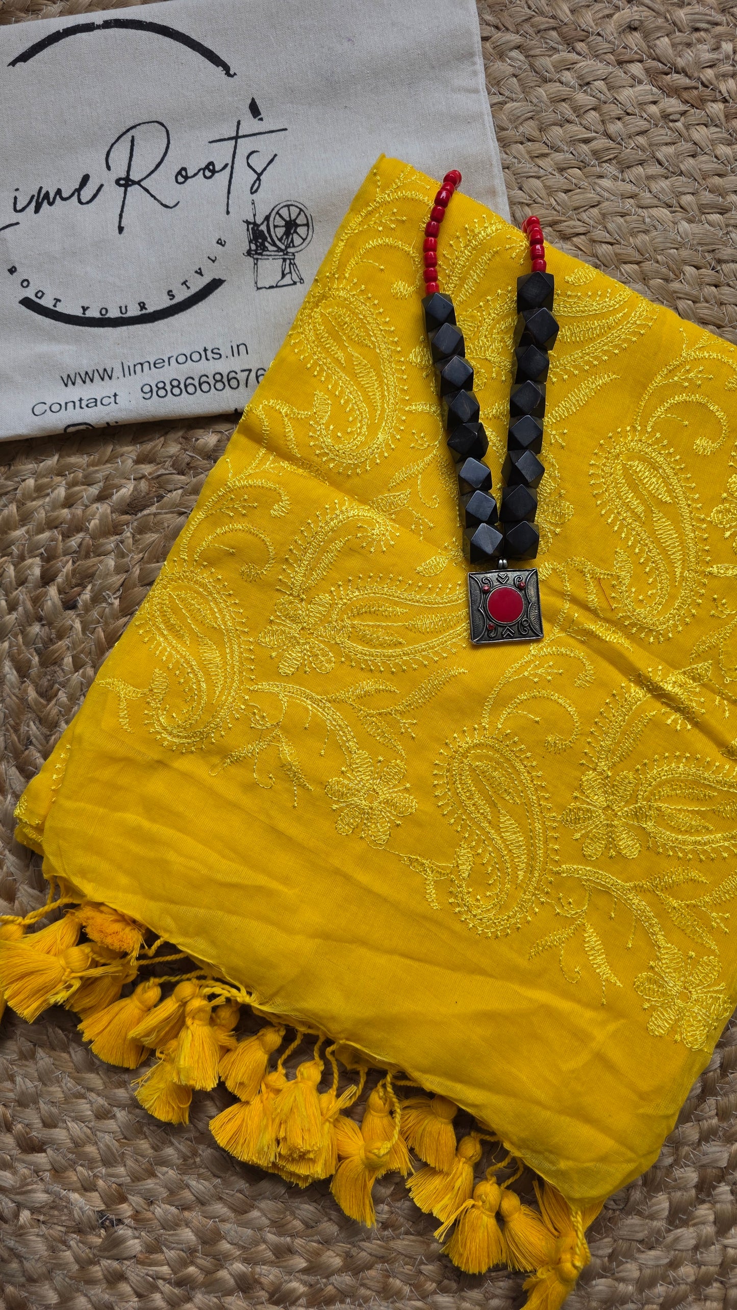 Adaa Yellow Mulmul Chikankari embroidery Saree