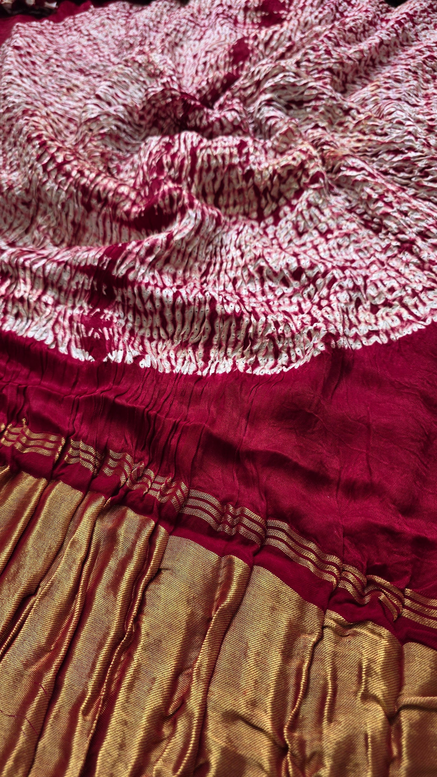 Boond| Maroon plain Bandhej Saree with Rasmandal Pallu