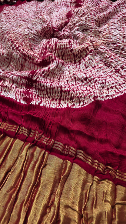 Boond| Maroon plain Bandhej Saree with Rasmandal Pallu