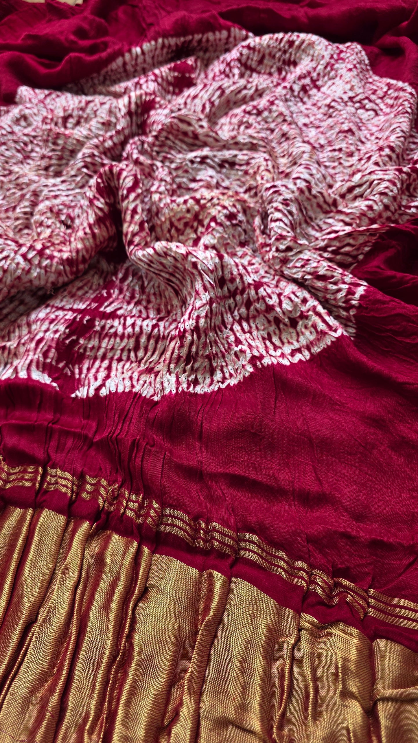 Boond| Maroon plain Bandhej Saree with Rasmandal Pallu