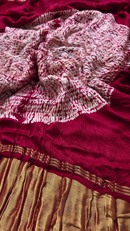 Boond| Maroon plain Bandhej Saree with Rasmandal Pallu