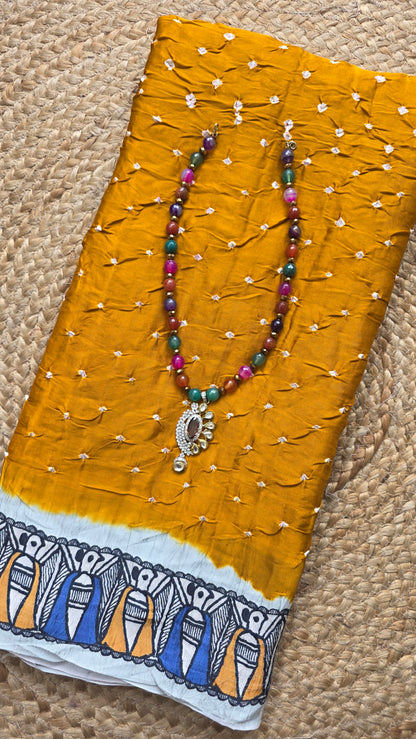 Boond | Mustard yellow Bandhej with pichwai Tissue pallu