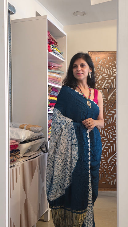 Boond| Emerald green plain Bandhej Saree with Rasmandal Pallu