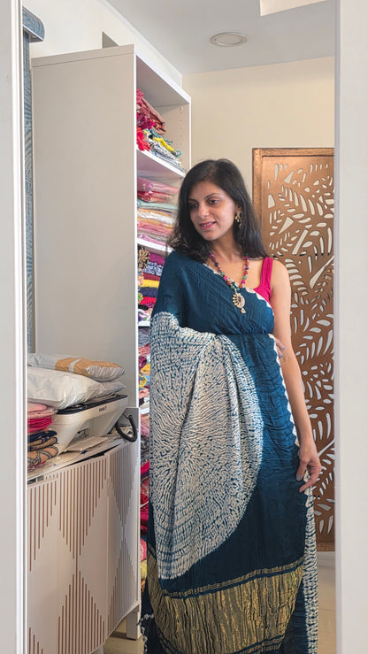 Boond| Emerald green plain Bandhej Saree with Rasmandal Pallu