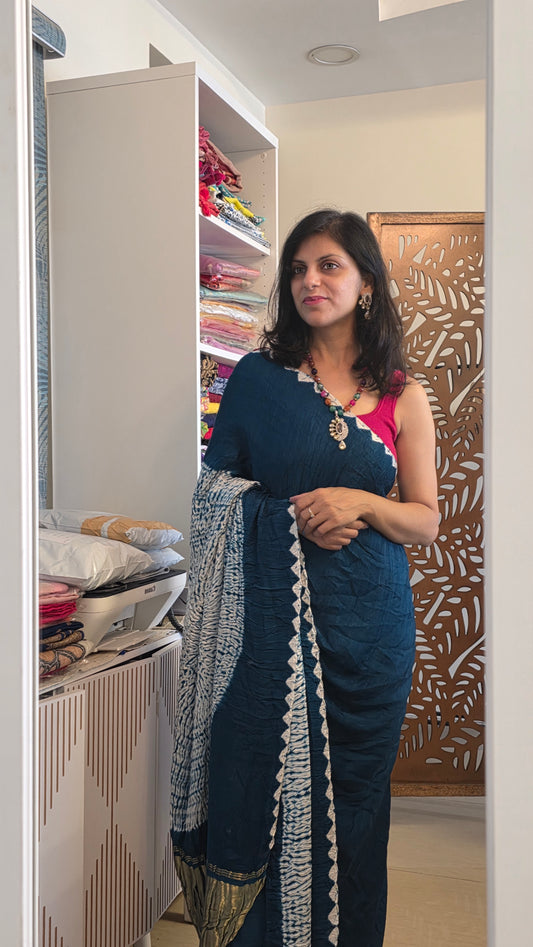 Boond| Emerald green plain Bandhej Saree with Rasmandal Pallu