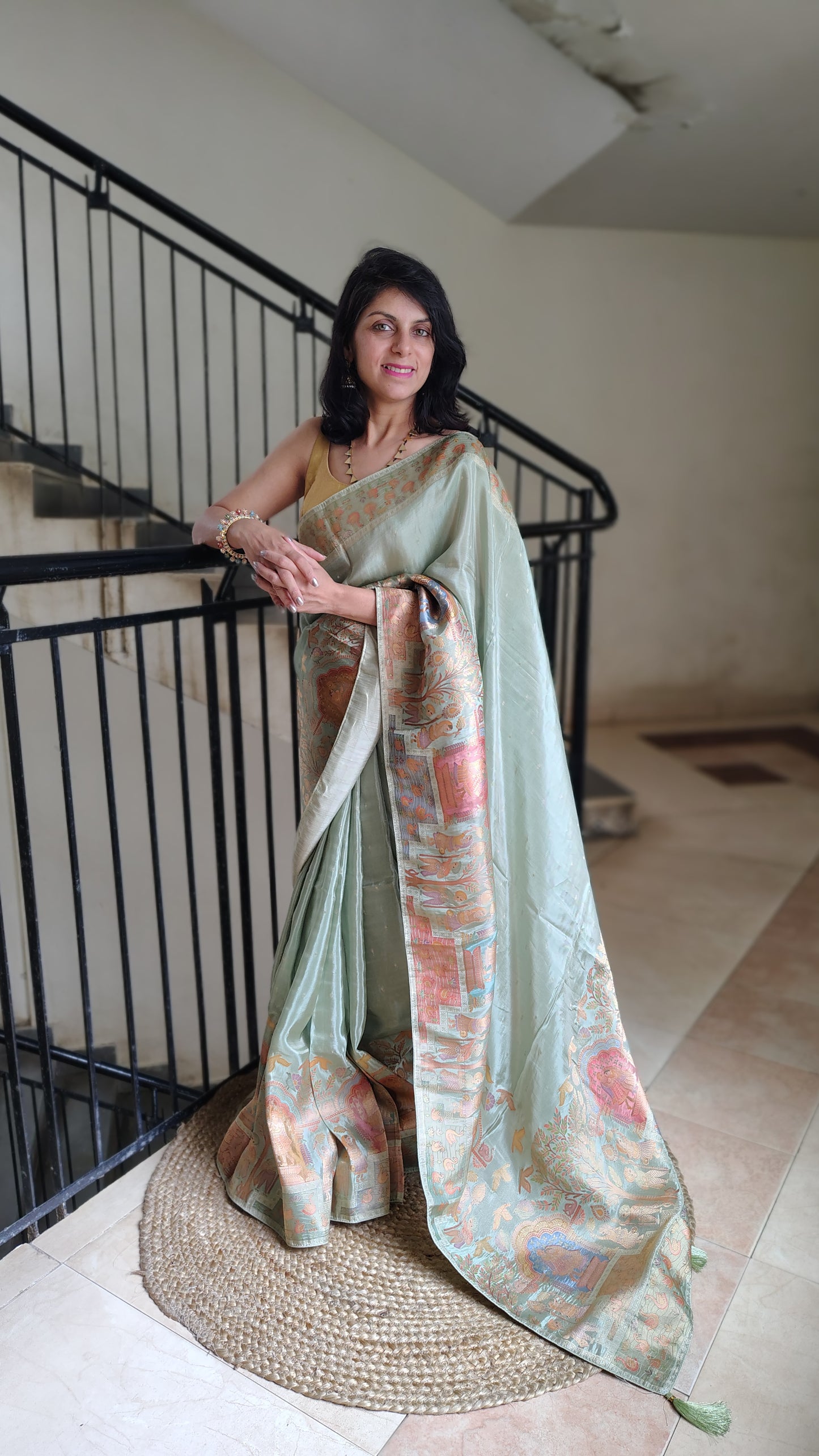 Metallic green Banarasi Tissue Silk Saree with Figure Weaves
