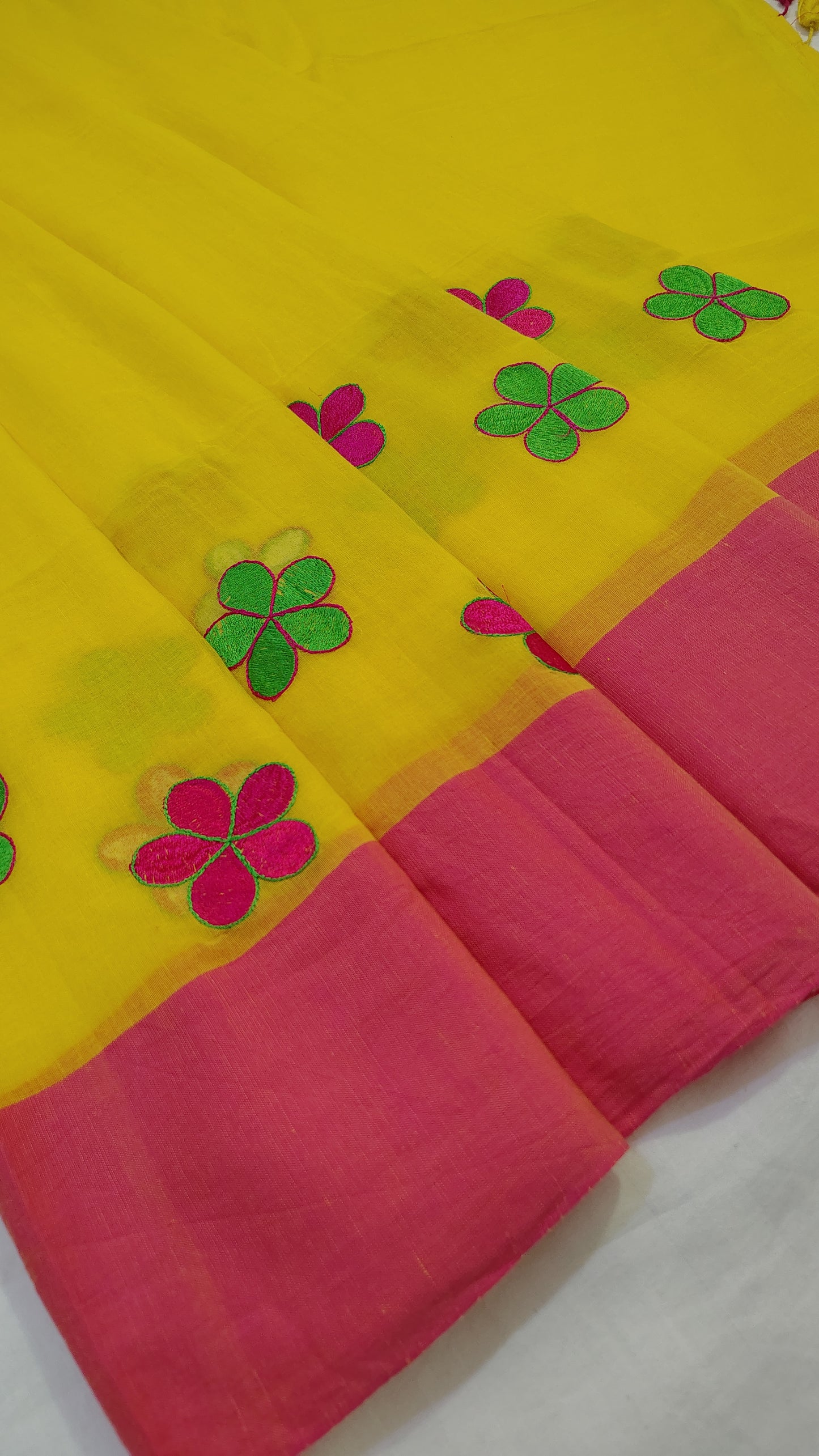 Yellow floral embroidery mul mul Saree