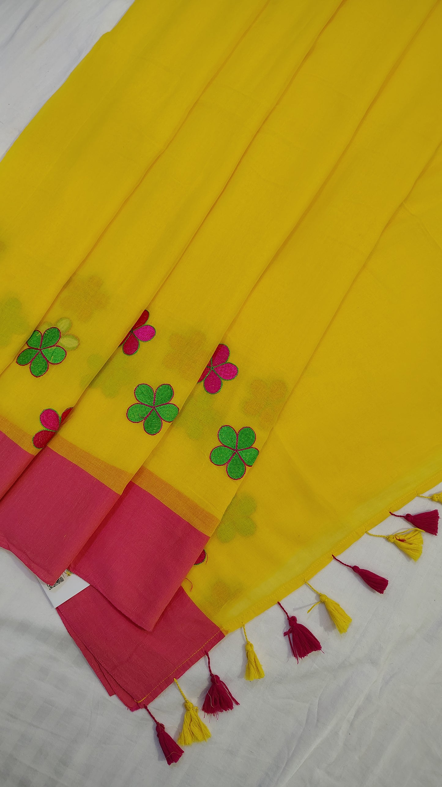 Yellow floral embroidery mul mul Saree